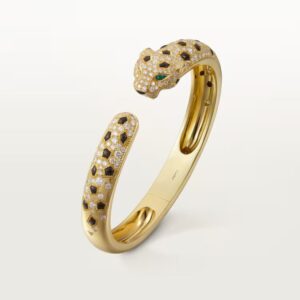 18K YELLOW GOLD ONYX, EMERALD AND DIAMOND BRACELET