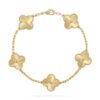 18K YELLOW GOLD 5 MOTIF BRACELET